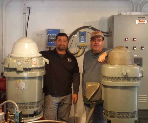 workers standing by pumps